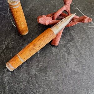 Omas Rollerball  pen is made from oak wood barrels